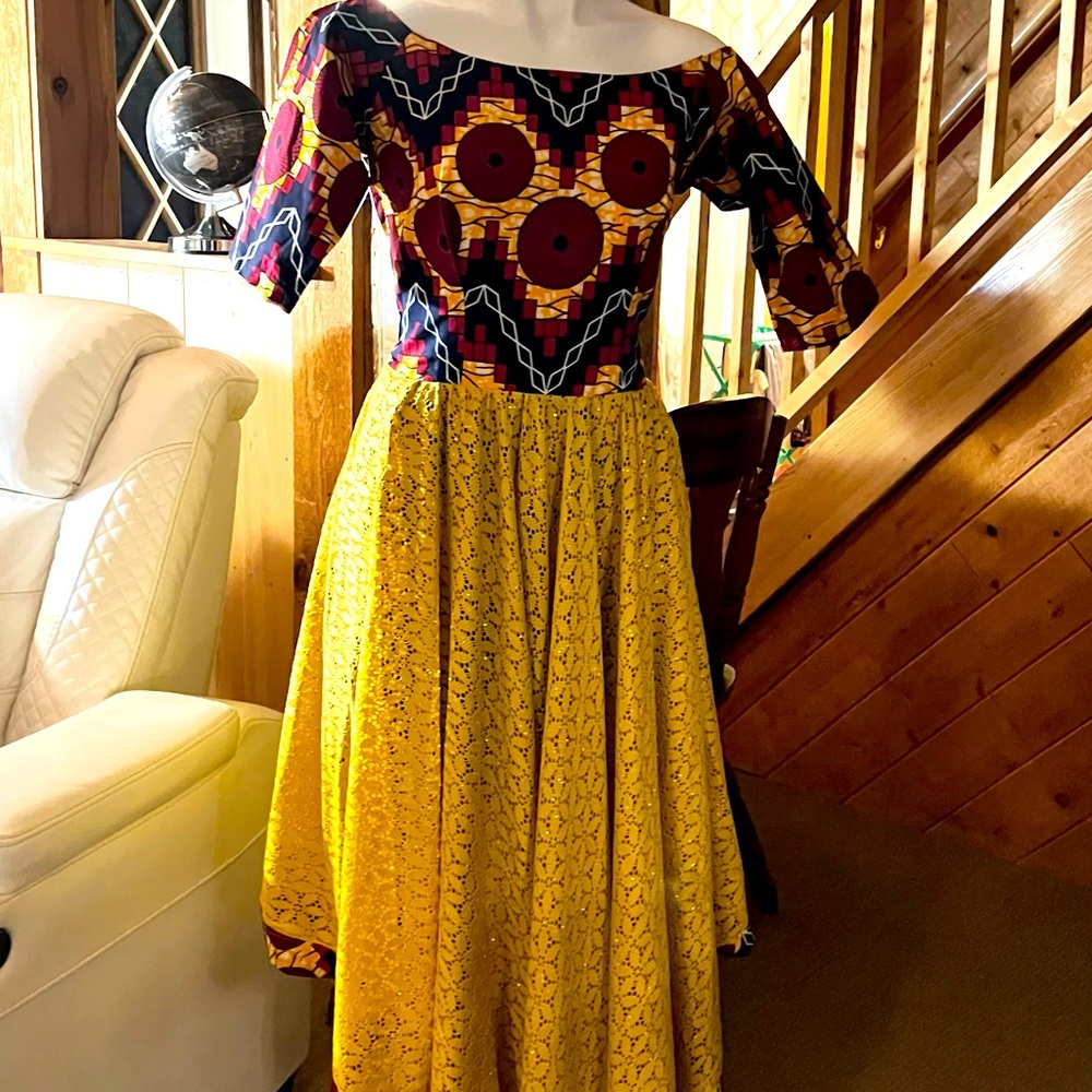 African print, chest 36”, Waist 30” leagth 54” any questions let me know.